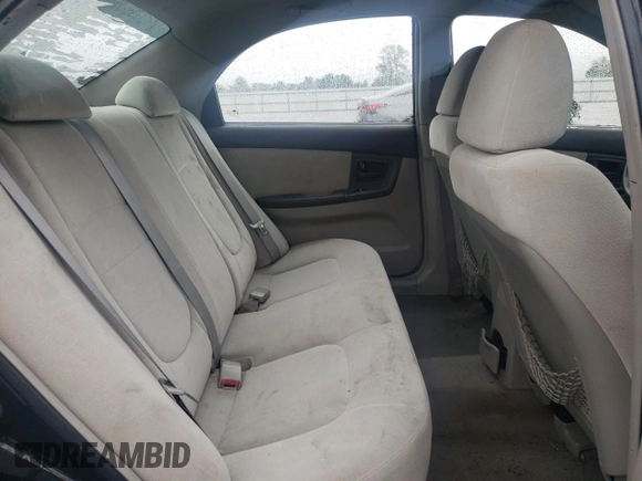 2005 Kia Spectra LX with VIN KNAFE121055134568, listed as a Copart auction lot 71541244 with 146,751 mi miles and Salvage Title. Bid and sale history available at carsss.com. Image 10.