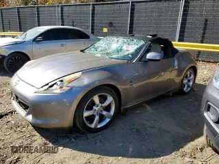 2010 Nissan 370Z Touring with VIN JN1AZ4FH1AM300240, listed as a Copart auction lot 74927643 with 136,483 mi miles and Salvage Title. Bid and sale history available at carsss.com. Image 1.