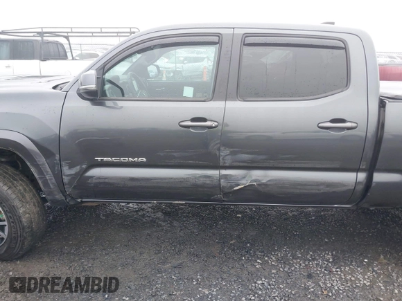 2021 Toyota Tacoma 4WD SR5 with VIN 3TMDZ5BN4MM099423, listed as a IAAI auction lot 41208397 with 62,935 mi miles. Bid and sale history available at carsss.com. Image 6.