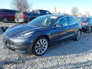 2020 Tesla Model 3 Long Range with VIN 5YJ3E1EB9LF795408, listed as a IAAI auction lot 41735428 with 56,013 mi miles. Bid and sale history available at carsss.com. Image 23.