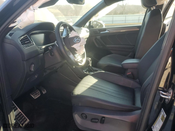 2023 Volkswagen Tiguan SE R-Line Black with VIN 3VVCB7AX0PM017529, listed as a Copart auction lot 47434095 with 55,212 mi miles and Salvage Title. Bid and sale history available at carsss.com. Image 7.