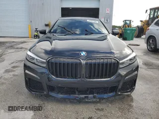 2022 BMW 7 Series 750i xDrive with VIN WBA7U2C01NCK83702, listed as a Copart auction lot 74327704 with Not provided miles and Salvage title. Bid and sale history available at DreamBid. Image 5.