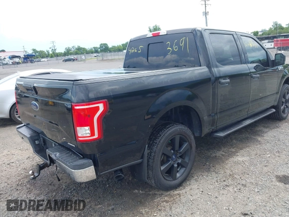 2015 Ford F-150 XLT z VIN 1FTEW1EF0FFA73964, wystawiony jako IAAI lot #42653691 z przebiegiem 129 866 mil mil oraz . Historia ofert i sprzedaży dostępna na DreamBid. Obrazek 4.