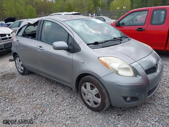 2010 Toyota Yaris with VIN JTDKT4K38A5296999, listed as a IAAI auction lot 41878127 with 122,692 mi miles. Bid and sale history available at carsss.com. Image 1.