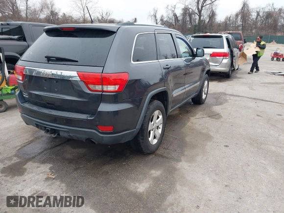 2013 Jeep Grand Cherokee Laredo with VIN 1C4RJFAG9DC506238, listed as a IAAI auction lot 41800981 with 172,676 mi miles. Bid and sale history available at carsss.com. Image 4.