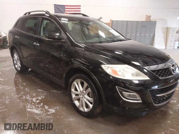 2012 Mazda CX-9 Grand Touring with VIN JM3TB2DA0C0337897, listed as a IAAI auction lot 41324433 with 173,077 mi miles. Bid and sale history available at carsss.com. Image 1.