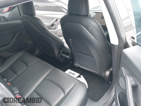 2023 Tesla Model 3 z VIN 5YJ3E1EAXPF403095, wystawiony jako IAAI lot #42151764 z przebiegiem 17 872 mil mil oraz . Historia ofert i sprzedaży dostępna na DreamBid. Obrazek 8.