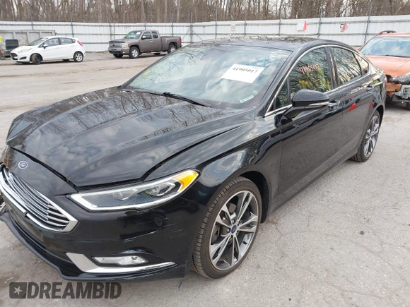 2017 Ford Fusion Titanium z VIN 3FA6P0K98HR200272, wystawiony jako IAAI lot #41905017 z przebiegiem 104 132 mil mil oraz . Historia ofert i sprzedaży dostępna na DreamBid. Obrazek 17.
