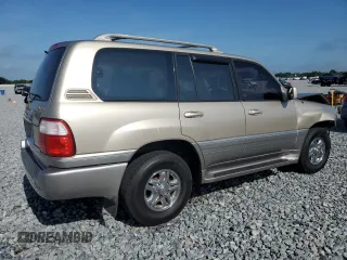 1999 Lexus LX 470 z VIN JT6HT00W1X0045075, wystawiony jako Copart lot #55684785 z przebiegiem 168 855 mil mil oraz Szkody całkowita. Historia ofert i sprzedaży dostępna na DreamBid. Obrazek 3.