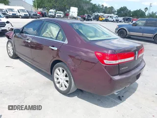 2011 Lincoln MKZ with VIN 3LNHL2GC1BR764783, listed as a IAAI auction lot 39223837 with 118,210 mi miles and . Bid and sale history available at DreamBid. Image 3.