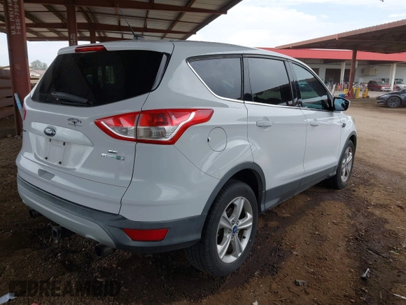 2013 Ford Escape SE with VIN 1FMCU0G95DUD02318, listed as a IAAI auction lot 42195213 with 202,434 mi miles and . Bid and sale history available at DreamBid. Image 4.