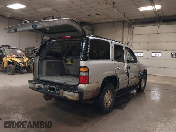 2004 GMC Yukon SLT with VIN 1GKEK13TX4J155865, listed as a IAAI auction lot 41758663 with 281,531 mi miles. Bid and sale history available at carsss.com. Image 4.