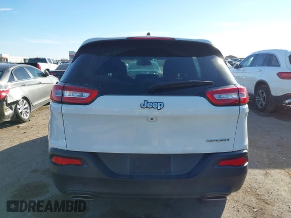 2016 Jeep Cherokee Sport with VIN 1C4PJLAS4GW329417, listed as a IAAI auction lot 41355231 with 151,680 mi miles. Bid and sale history available at carsss.com. Image 16.