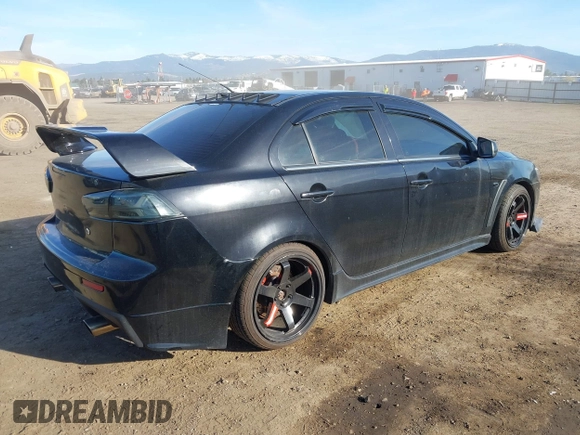 2009 Mitsubishi Lancer with VIN JA3AV66V39U040203, listed as a IAAI auction lot 41884811 with 117,429 mi miles and . Bid and sale history available at DreamBid. Image 4.