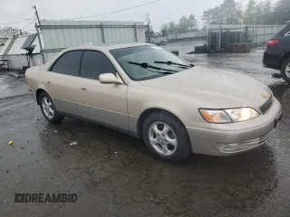 1998 Lexus ES 300 с VIN JT8BF28G1W5047813, выставлен на аукционе Copart как лот 55813415 с пробегом 111 663 миль миль и Списание • Salvage title. История ставок и продаж доступна на DreamBid. Изображение 4.