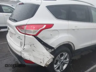 2016 Ford Escape SE with VIN 1FMCU0GX4GUC23998, listed as a IAAI auction lot 41917522 with 96,491 mi miles and . Bid and sale history available at carsss.com. Image 6.
