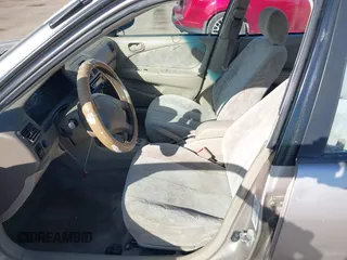 1998 Toyota Corolla VE z VIN 2T1BR18E9WC045442, wystawiony jako IAAI lot #42104201 z przebiegiem 243 256 mil mil oraz . Historia ofert i sprzedaży dostępna na DreamBid. Obrazek 5.