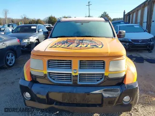 2011 Dodge Nitro SXT with VIN 1D4PU5GK9BW535743, listed as a IAAI auction lot 41200573 with 155,239 mi miles. Bid and sale history available at carsss.com. Image 13.