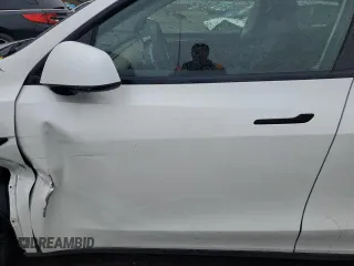 2023 Tesla Model Y Long Range with VIN 7SAYGDEEXPA122953, listed as a Copart auction lot 52627095 with Not Provided miles and Salvage Title. Bid and sale history available at DreamBid. Image 7.