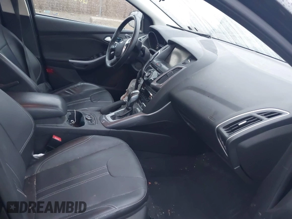 2014 Ford Focus Titanium with VIN 1FADP3J24EL439065, listed as a IAAI auction lot 40868973 with 167,739 mi miles. Bid and sale history available at carsss.com. Image 5.