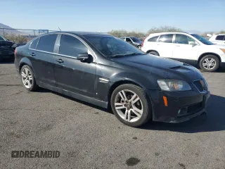2009 Pontiac G8 z VIN 6G2ER57769L215137, wystawiony jako Copart lot #52262665 z przebiegiem 174 574 mil mil oraz Czysty tytuł • Clean title. Historia ofert i sprzedaży dostępna na DreamBid. Obrazek 4.