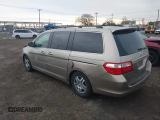 2005 Honda Odyssey EX with VIN 5FNRL38455B115547, listed as a IAAI auction lot 41911371 with 184,150 mi miles. Bid and sale history available at carsss.com. Image 3.