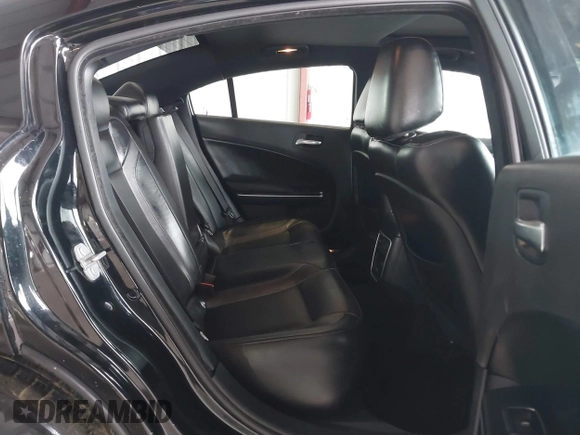 2020 Dodge Charger SXT with VIN 2C3CDXBG0LH211627, listed as a IAAI auction lot 41793868 with 104,587 mi miles and . Bid and sale history available at DreamBid. Image 8.