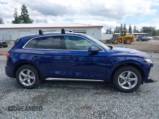 2021 Audi Q5 Premium z VIN WA1AAAFY6M2023257, wystawiony jako IAAI lot #42327039 z przebiegiem 21 736 mil mil oraz . Historia ofert i sprzedaży dostępna na DreamBid. Obrazek 14.