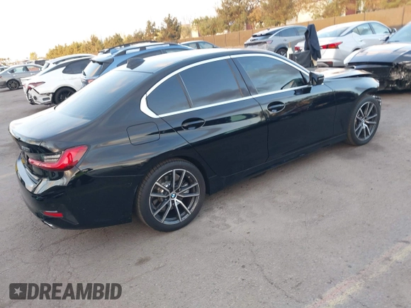 2021 BMW 3 Series 330i with VIN 3MW5R1J07M8B47179, listed as a IAAI auction lot 41450153 with 66,689 mi miles. Bid and sale history available at carsss.com. Image 4.