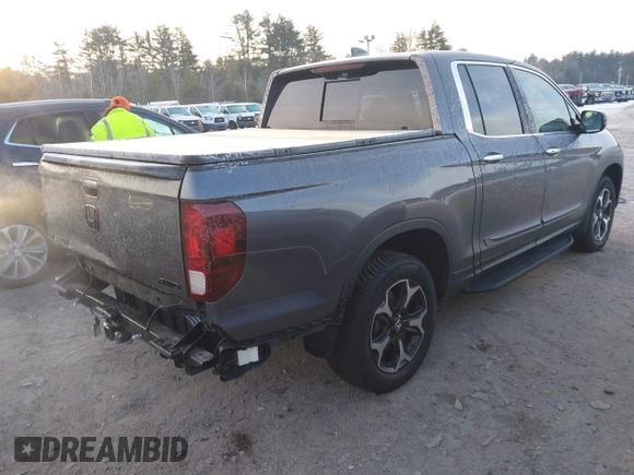 2020 Honda Ridgeline RTL-E with VIN 5FPYK3F70LB008292, listed as a IAAI auction lot 41357744 with 81,961 mi miles and . Bid and sale history available at DreamBid. Image 4.