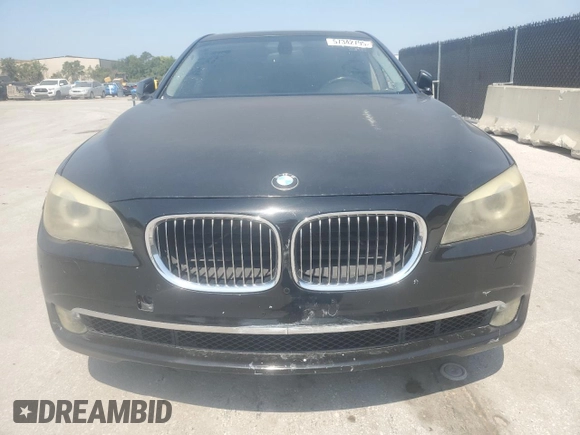2012 BMW 7 Series 740i with VIN WBAKA4C56CC613745, listed as a Copart auction lot 57342795 with 139,889 mi miles and Clean title. Bid and sale history available at DreamBid. Image 5.