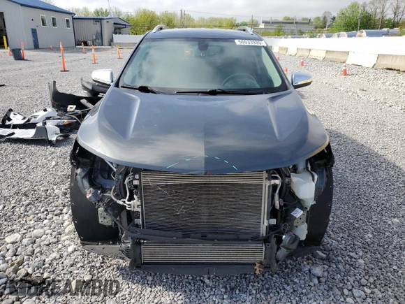 2019 Chevrolet Equinox Premier z VIN 2GNAXNEV5K6302984, wystawiony jako Copart lot #56033935 z przebiegiem 59 554 mil mil oraz Szkoda całkowita • Salvage title. Historia ofert i sprzedaży dostępna na DreamBid. Obrazek 5.