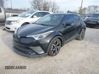 2018 Toyota C-HR XLE with VIN NMTKHMBX9JR001731, listed as a IAAI auction lot 41835918 with 138,087 mi miles. Bid and sale history available at carsss.com. Image 2.