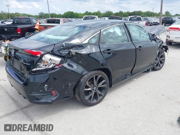 2019 Honda Civic Sport with VIN 19XFC2F85KE015159, listed as a IAAI auction lot 41993276 with 82,542 mi miles and . Bid and sale history available at DreamBid. Image 4.