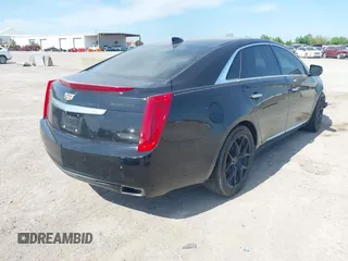 2017 Cadillac XTS Luxury with VIN 2G61M5S39H9161089, listed as a IAAI auction lot 42005971 with 106,532 mi miles. Bid and sale history available at carsss.com. Image 4.