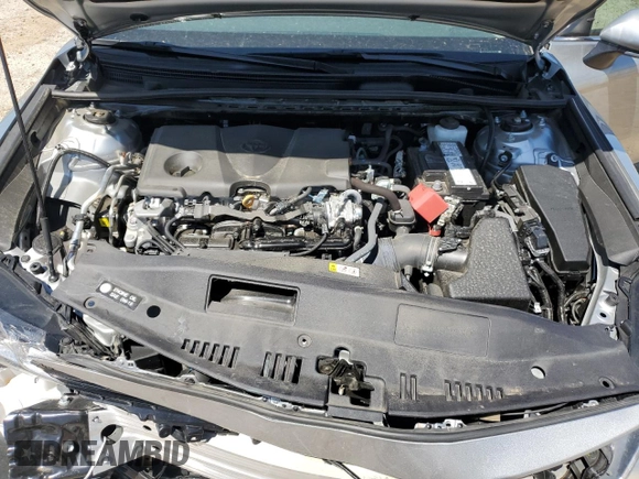 2024 Toyota Camry LE z VIN 4T1C11AK8RU261202, wystawiony jako Copart lot #53353235 z przebiegiem 22 487 mil mil oraz Szkoda całkowita • Salvage title. Historia ofert i sprzedaży dostępna na DreamBid. Obrazek 12.