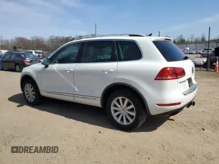 2012 Volkswagen Touareg Sport with VIN WVGEF9BP3CD011165, listed as a Copart auction lot 48913935 with 118,839 mi miles and Salvage Title. Bid and sale history available at DreamBid. Image 2.