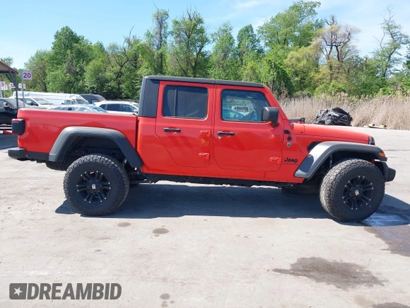 2020 Jeep Gladiator Sport S z VIN 1C6HJTAG0LL149161, wystawiony jako IAAI lot #42071132 z przebiegiem 153 062 mil mil oraz . Historia ofert i sprzedaży dostępna na DreamBid. Obrazek 13.