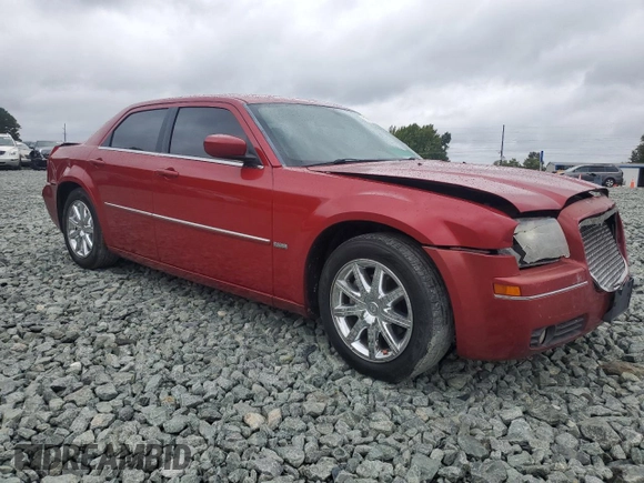2009 Chrysler 300 Touring with VIN 2C3KA53V99H617274, listed as a Copart auction lot 71791144 with 123,045 mi miles and Salvage Title. Bid and sale history available at carsss.com. Image 4.