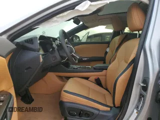 2024 Lexus RZ 300e Premium z VIN JTJABABB2RA000668, wystawiony jako Copart lot #71710714 z przebiegiem 9387 mil mil oraz Szkody całkowita. Historia ofert i sprzedaży dostępna na DreamBid. Obrazek 7.