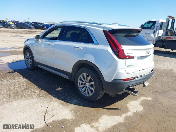 2020 Cadillac XT4 FWD Premium Luxury with VIN 1GYFZCR45LF138622, listed as a IAAI auction lot 41764535 with 99,079 mi miles. Bid and sale history available at carsss.com. Image 3.