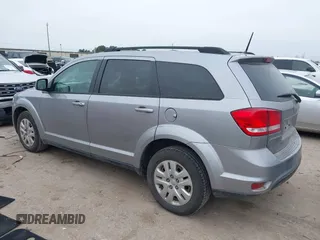 2019 Dodge Journey SE with VIN 3C4PDCBB0KT816103, listed as a IAAI auction lot 41640272 with 118,310 mi miles and . Bid and sale history available at DreamBid. Image 3.