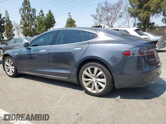 2014 Tesla Model S 60 z VIN 5YJSA1H11EFP64764, wystawiony jako Copart lot #64265815 z przebiegiem 126 191 mil mil oraz Szkoda całkowita • Salvage title. Historia ofert i sprzedaży dostępna na DreamBid. Obrazek 2.