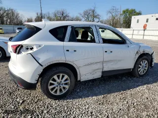 2014 Mazda CX-5 Touring with VIN JM3KE2CY8E0350661, listed as a Copart auction lot 51739805 with 219,351 mi miles and Salvage Title. Bid and sale history available at carsss.com. Image 3.