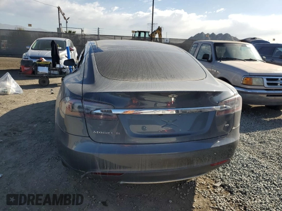 2013 Tesla Model S with VIN 5YJSA1CG9DFP09733, listed as a Copart auction lot 87739005 with 88,163 mi miles and Salvage title. Bid and sale history available at DreamBid. Image 6.