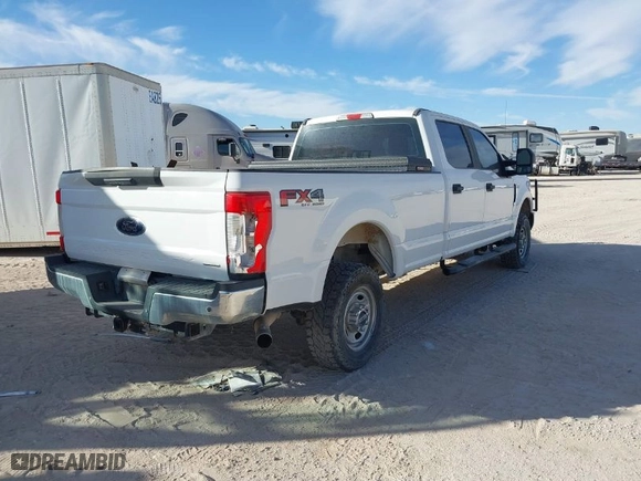 2017 Ford Super Duty F-250 SRW Lariat with VIN 1FT7W2B69HEE55373, listed as a IAAI auction lot 41676791 with 153,219 mi miles. Bid and sale history available at carsss.com. Image 4.