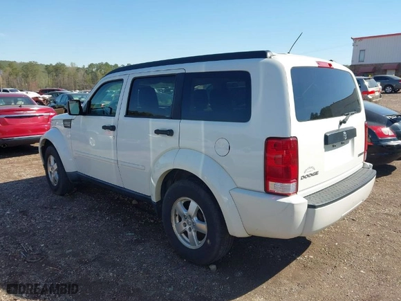 2009 Dodge Nitro SE with VIN 1D8GT28K19W518279, listed as a IAAI auction lot 41855238 with 186,607 mi miles. Bid and sale history available at carsss.com. Image 3.