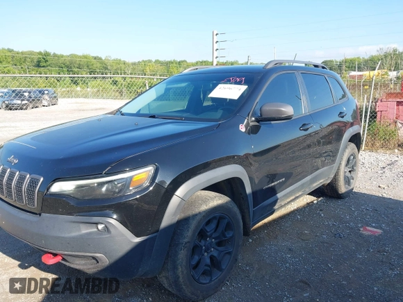2019 Jeep Cherokee Trailhawk with VIN 1C4PJMBX3KD483895, listed as a IAAI auction lot 42696774 with 122,932 mi miles and . Bid and sale history available at DreamBid. Image 17.