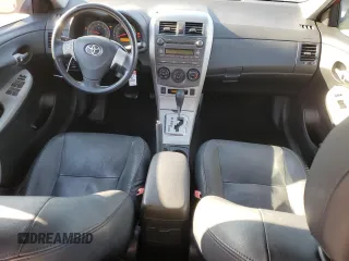 2010 Toyota Corolla with VIN 1NXBU4EE1AZ231682, listed as a Copart auction lot 84146264 with 194,949 mi miles and Salvage Title. Bid and sale history available at DreamBid. Image 8.