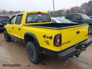 2004 Dodge Dakota Sport with VIN 1D7HG38N64S752270, listed as a IAAI auction lot 41555599 with 121,283 mi miles. Bid and sale history available at carsss.com. Image 3.